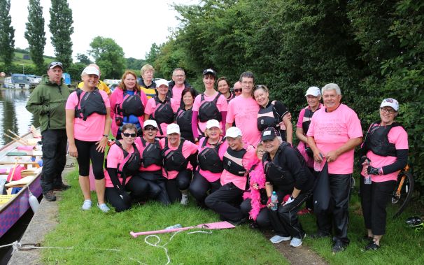 A mixed team of cancer survivors and supporters rest after completing the first leg of the Lancaster Canal paddle from Bilsborrow to Galgate.