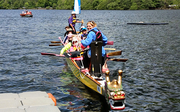 Keni coaches a team of paddlers to develop their paddling technique.