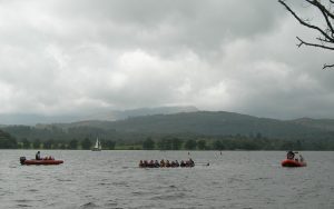 Dragon boat swamping exercise on Windermere for safety practice.