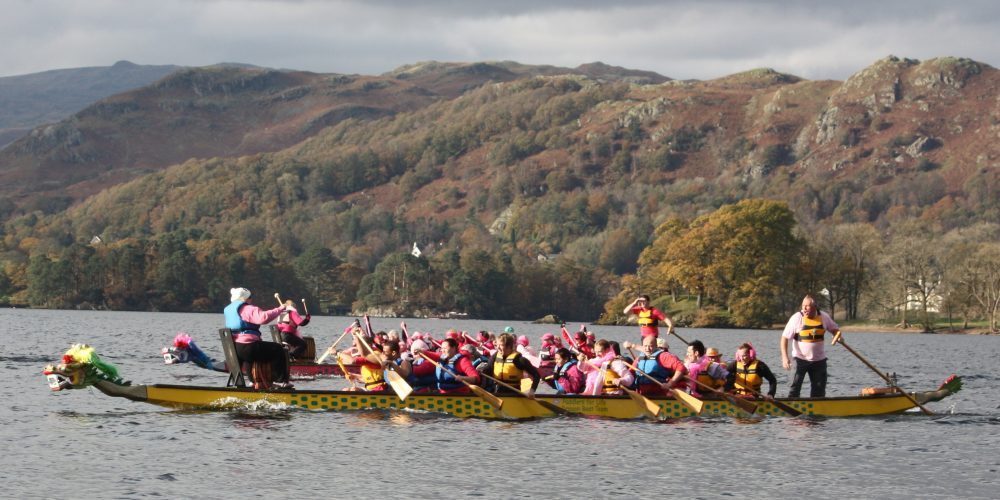 Paddle in pink finishes with a race against a crew of Low Wood staff in 2011.