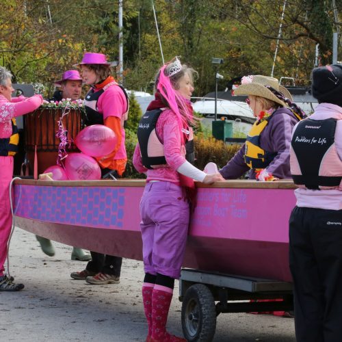 Preparing the dragon boat for a pink paddle 2012.